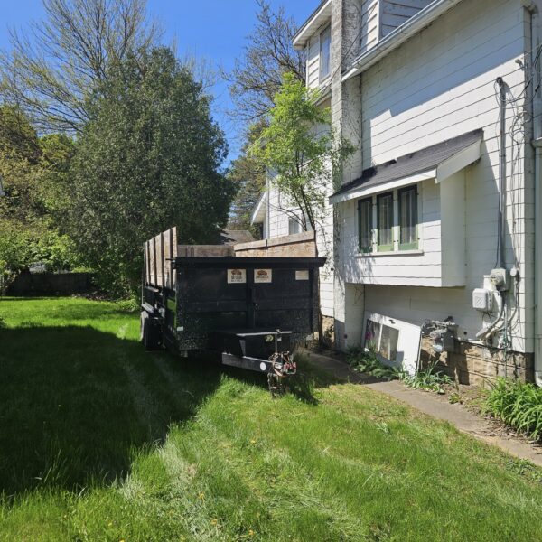 Dumpster trailer rental delivered in Belding MI by Driskell on Demand